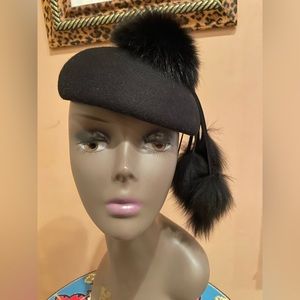 Black wool hat with black fox. No brand listed.